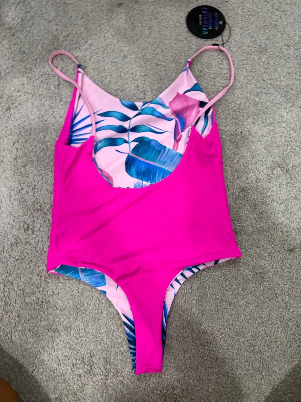 Roxy Pink One-Piece Swimsuit with Blue Tropical Leaf Design